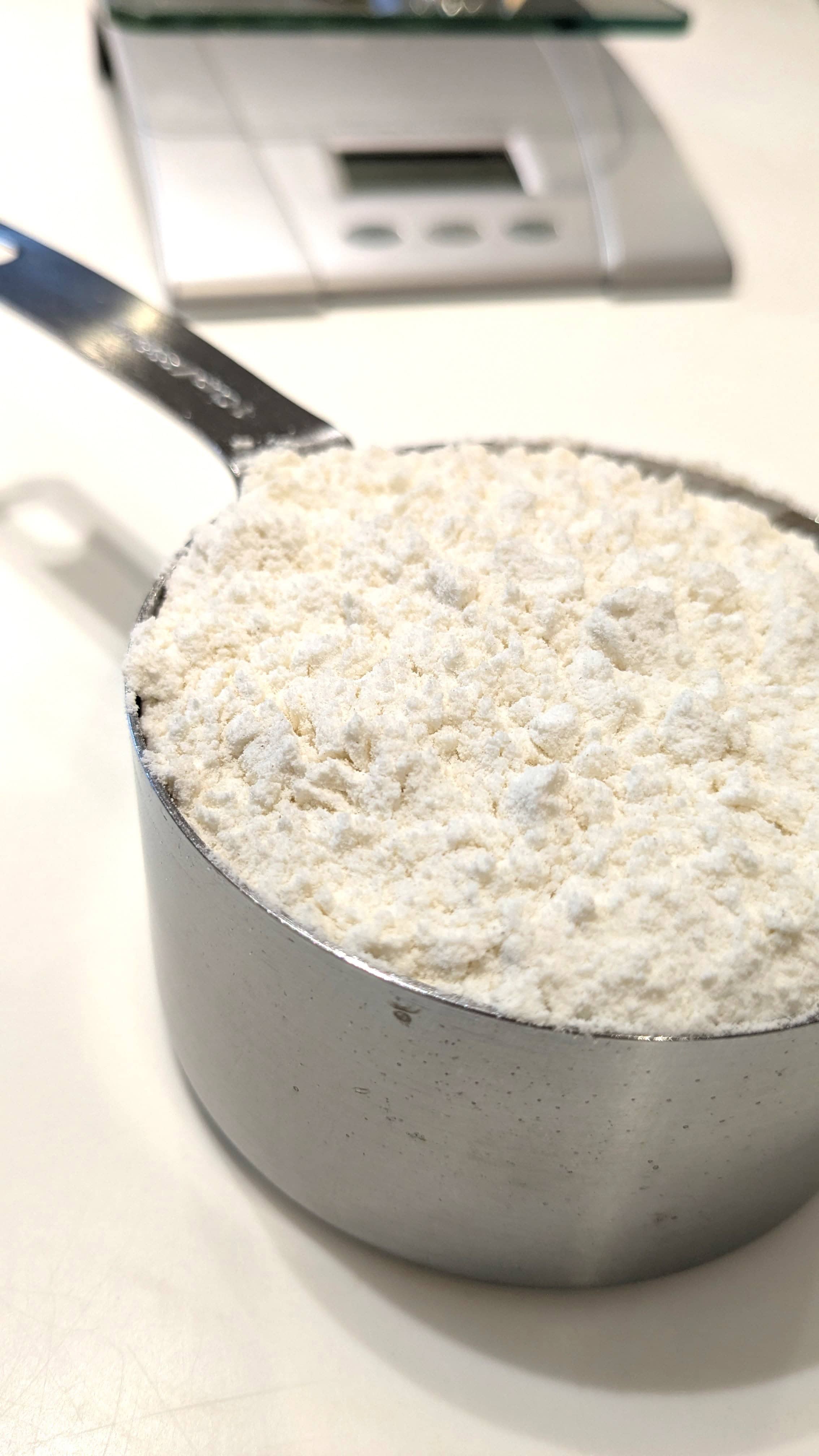 Image of measuring cup of flour