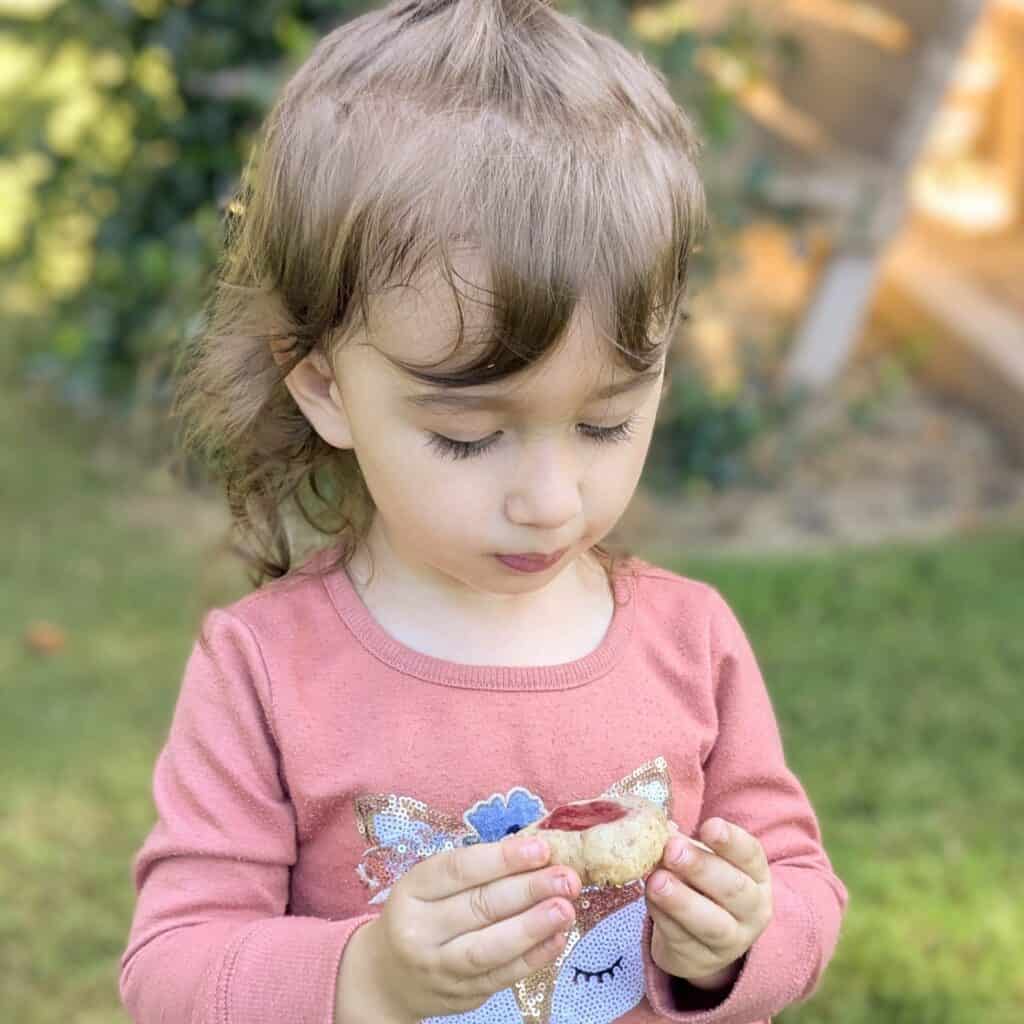 Image of Child Eating Treat